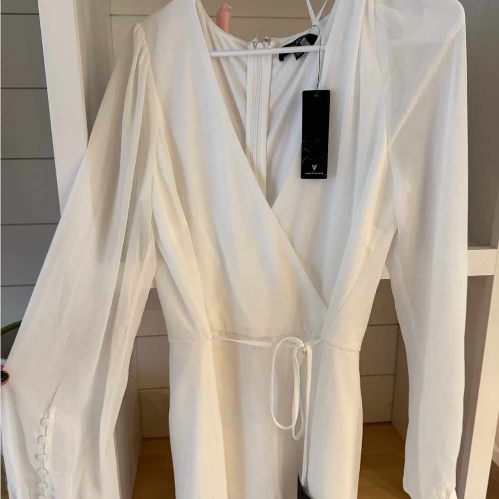 Lulu's Ivory Wrap romper